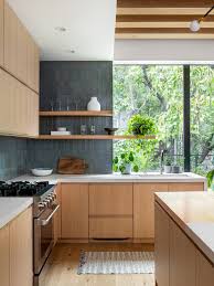 Rustic and functional, this concrete diy outdoor kitchen keeps everything handy in the open shelving and provides plenty of food prep surface. This Stewart Schafer Brooklyn Kitchen Before And After Is Unrecognizable Brooklyn Kitchen Stewartschaf Indoor Outdoor Kitchen Kitchen Design Brooklyn Kitchen