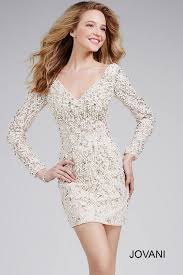 Jovani Dress 22016 Ivory Fitted Short Cocktail Dress With A Deep V Neck And Long Sleeves Long Sleeve Lace Cocktail Dress Long Sleeve Lace Dress Short Cocktail Dress