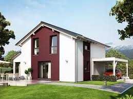 Modernes Einfamilienhaus Mit Flach Geneigtem Satteldach Wintergarten Erker Carport Haus Bauen Ideen Fertighaus Living Haus S Fassade Haus Haus Living Haus