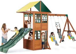 The tall back and large leg holes make it easy to get your little one in and out while still providing the support they need. Kid Kraft Treasure Cove Swing Set Wooden Swing Set Big Backyard Swing Set