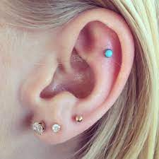 Three Love Piercings And A Flat Cartilage Piercing Adding Another Soon Hopefully Pretty Ear Piercings Cute Ear Piercings Three Ear Piercings