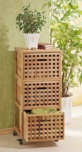 Rollcontainer Regal Waschebox Schrank Aus Walnuss Holz Amazon De Kuche Haushalt Walnussholz Waschesammler Ikea Rollcontainer
