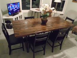 The picket house furnishings carter 5 piece counter height dining set features a trestle base table with angular supports and four splat back chairs. Solid Wood Trestle Table With Six Farm Style Black Chairs The Table Is Solid Douglas Refurbished Furniture Table Wood Table Black Chairs Refurbished Furniture