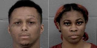 Man, woman charged in deadly shooting of man found in car at Charlotte gas  station