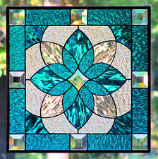 Stained glass designs can be combined with obscure or patterned background glass for an additional design twist or added privacy and security. Simple Stained Glass Designs