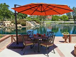 When Looking For The Best Wind Resistant Patio Umbrella The Most Important Points You Need To Kee Best Patio Umbrella Pool Patio Decor Outdoor Patio Umbrellas