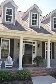 Black And White House Exterior Paint Black Door Gray Shingles White House Paint Exterior Exterior Paint Colors For House House Exterior