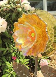 Maybe you would like to learn more about one of these? Glass Plate Flower Glass Flowers Garden Art Yard Art Suncatcher Diy Homemade Whimsy Repurposed Upcy Glass Garden Flowers Glass Garden Art Glass Garden
