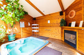 Our estes park hut tub is the perfect way to relax after a day on the trails. Wildwood Inn
