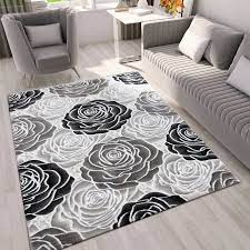 Die feurige farbe ist auch für die rote lichtnelke und den aurorafalter namensgebend. Moderner Wohnzimmer Teppich Rosen Muster In Schwarz Grau Creme Ebay