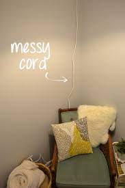 How To Hang A Swag Light And Brighten Any Room The Diy Playbook Hanging Lights Living Room Plug In Hanging Light Living Room Pendant