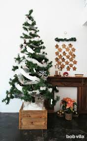 This Diy Christmas Tree Stand Makes Your Fake Fir Look Real And Taller Xmas Tree Stands Christmas Tree Stand Diy Creative Christmas Trees