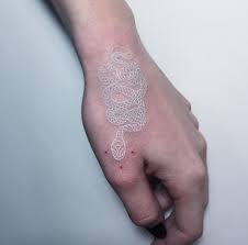 The snake tattoo design most often chosen to depict the meaning of rebirth is that of the ouroboros. Serpentine Monochromatic Tattoos Snake Tattoo Designs