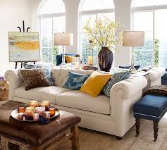 How about having them as ottoman coffee tables? Caden Square Leather Ottoman Pottery Barn