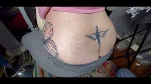 Tribal tattoos cover up with flowers and floral on back. Tattoo Cover Up On My Lower Back Youtube