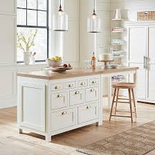 36 inches is a recommended standard height for a kitchen island. Millstone Wooden Kitchen Island Counter Height Table