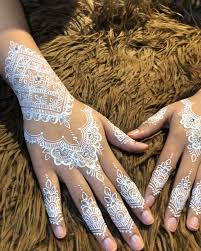 To create a tattoo, early henna artists usually use sticks, but today, there are cleaner methods of doing so. Syraskins Waterproof White Henna What Is White Henna White Henna Is Not Actually Henn White Henna Tattoo White Henna Designs Henna Tattoo Designs