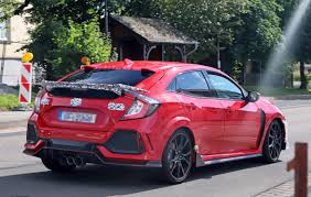 Honda civic type r red. 2019 Honda Civic Type R Spied In Red Differs From White Painted Prototype Autoevolution