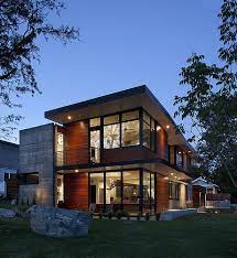 Industrial is a modern contemporary style that combines clean lines and minimalism with loft living or modern farmhouse aesthetics. A Modern Family Home For Racing Bike Enthusiasts Contemporary House Design Interior Architecture Design Architecture