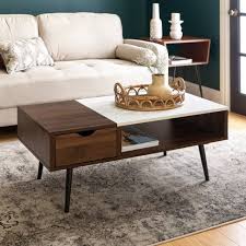 They also work well as living room coffee tables in modern homes. Pin By Alejandra Rojas On Decoracion Coffee Table Faux Marble Coffee Table Marble Coffee Table