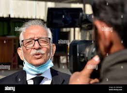 Mehmood A. Sheikh, defense lawyer of British-born Pakistani Ahmed Omar  Saeed Sheikh, talks to the media outside the Supreme Court after an appeal  hearing in the Daniel Pearl case, in Islamabad, Pakistan,