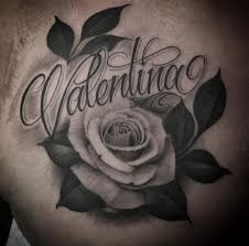 Rose outline tattoos are usually suited to different areas of the chest and different personality types. Chest Lettering Rose Tattoo By Kings Avenue Tattoo