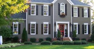 The first step was taking down the shutters, cleaning them, and then painting them. Accenting This Grey House With Black Dark Shutters Is A Perfect Contrast The Shutters Gray House Exterior House Paint Exterior Exterior Paint Colors For House
