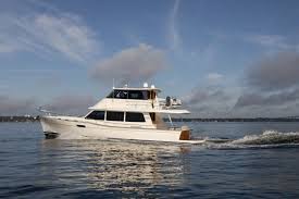 This beautiful, completely redesigned yacht pays homage to classic grand banks styling, with a special focus on performance and fuel consumption. Boat Test Grand Banks 60 Fly Sl Review Motor Boat Yachting
