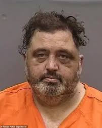 Moment gunman in Devil mask tries to storm Tamp strip club and is stopped  by former MMA fighter