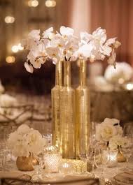 You can trust brant florist! Pretty Gold Bottle Vases And Flowers Wonderful For A 50th Golden Wedding Anniversary Wedding Centerpieces 50th Wedding Anniversary Party Golden Wedding