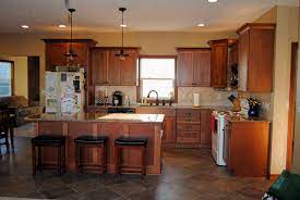 Cherry Cabinets Finished In Toffee With Chocolate Glaze Cambria Brownhill Quartz Countertops Kitchen Design Kitchen Redo Cherry Kitchen
