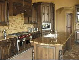 Using natural brown wooden feature and furniture, it looks natural blending with kitchen appliance. How To Give Your Kitchen A Tuscan Style
