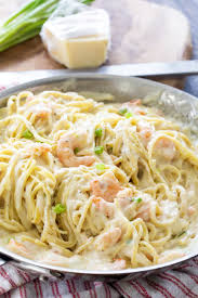 Remove the shrimp from the skillet with a slotted spoon and set aside to keep warm. Cheesy Garlic Shrimp Alfredo Spicy Southern Kitchen
