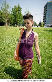All you need for this one is a sizeable quantity of hair product, such as hair wax, for example and you are already good to go! Beautiful Hipster Short Hair Woman In The Park In The City Canstock