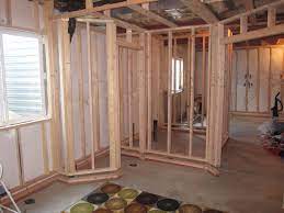 Floating walls in your basement can seem tricky, but it's really not. Before And After Pictures Finishing A Basement Bedroom Framing Basement Walls Framing A Basement Basement Walls