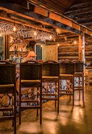 Thanksgiving day dinner table with roasted whole chicken or little turkey , pumpkin pie on dark. Greenville S Wildest Steakhouse Saskatoon Steakhouse Wild Game