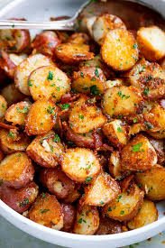Medium boiling potatoes (2 pounds). Roasted Garlic Potatoes With Butter Parmesan Best Roasted Potatoes Eatwell101