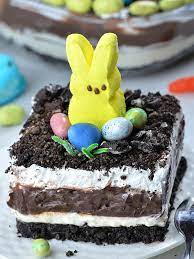 It's made with crushed oreos, cream cheese, chocolate pudding and cool whip and garnished with peeps and easter egg candies. Easter Chocolate Lasagna Easter Dessert Recipe