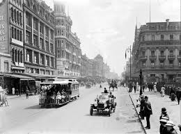 Flora Fountain 1900's. Note the trams ...
