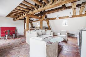 I know old wood i.e. Parisian Apartments With Exposed Beams 10 Inspiring Interiors