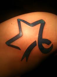 Ribbon tattoos are versatile pieces of art that can be used to carry different ideas. I Like This One The Star Stands For Hope Awareness And Education Love It And Look At It Every Da Cancer Tattoos Cancer Awareness Tattoo Colon Cancer Tattoos