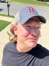 Growing out this mustache makes me realize why Grandma always told me I was  her little Alan Jackson.