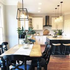 Bare wood flooring and matching cabinetry highlights add a hint of pastoral charm, while strategic. The Top 70 Best Modern Farmhouse Kitchen Ideas Interior Home And Design