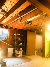 Are you thinking about panting your basement ceiling or leaving the ceiling exposed ceilings painted white with dryfal paint spiral duct work and track lighting atlanta ga. Diy Painted Basement Ceiling Project First Thyme Mom