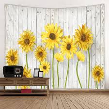 An amazing cotton celtic sunflower design printed tapestry wall hanging coverlet in flaunting beautiful sunflowers in hues of red, gold and blue color sunflowers on an earthen base.this tapestry features a gorgeous mandala design in the center with an elegant border all around. The Best Sunflower Tapestry Sunflower Wall Art Tapestry Nature Sunflower Print Fabric
