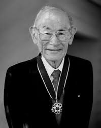 Photo: Fred Korematsu holding a letter from the U.S Government apologizing  for its unjust internment of Japanese Americans durin