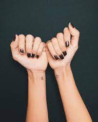 Minimal Sun And Moon Tattoos On Arms In This Board You Ll Find The Most Inspiring And Meaningful Mini Tattoos For G Moon Tattoo Wrist Mini Tattoos Sun Tattoos