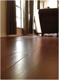 Walnut Colored Ceramic Tile Allows Us To Have The Wood Floor Look Without The Maintenance Plus Dog Fur Is Easier To Sweep T Flooring Wood Floors Floor Colors
