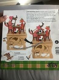 An illustration from the three little pigs childrens fairytale story, of the 3 pig cartoon characters with their straw, wooden and brick houses and the big bad wolf peeking from behind a tree. Madera De Little Red Riding Hood Y El Big Bad Wolf Movimiento Mecanico Automata Ebay