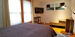 Member at rapid transit station · buffalo, new york. Signature Furnished Apartments By Buffalo Management Group